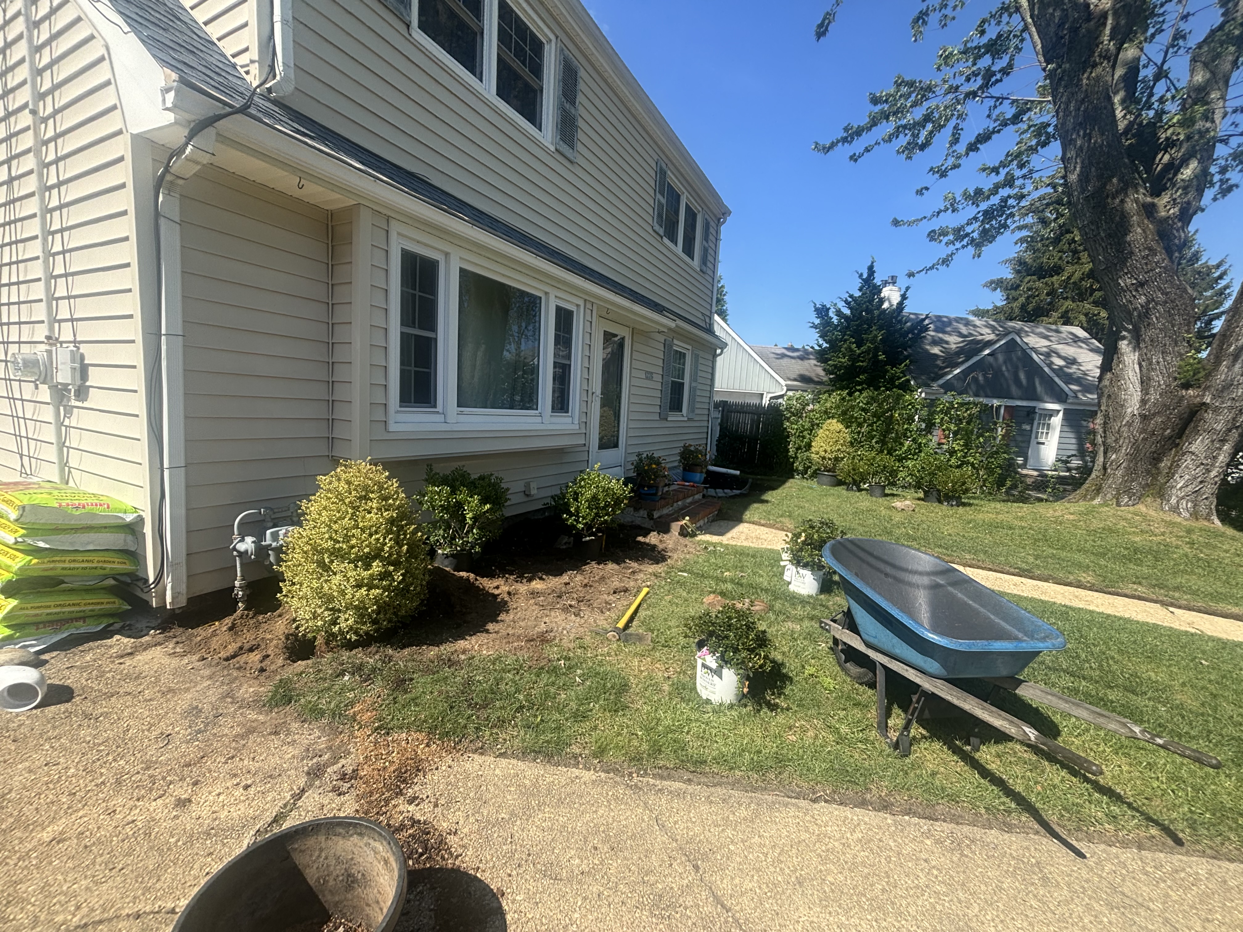 Backyard before landscaping transformation in New Jersey
